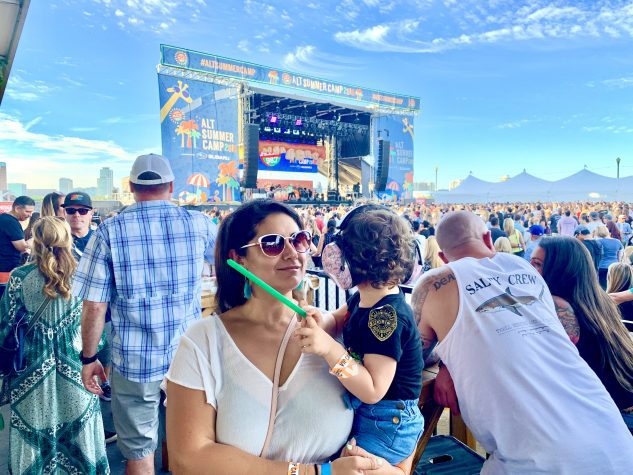 Sandra Burciaga Olinger at a music festival with her baby